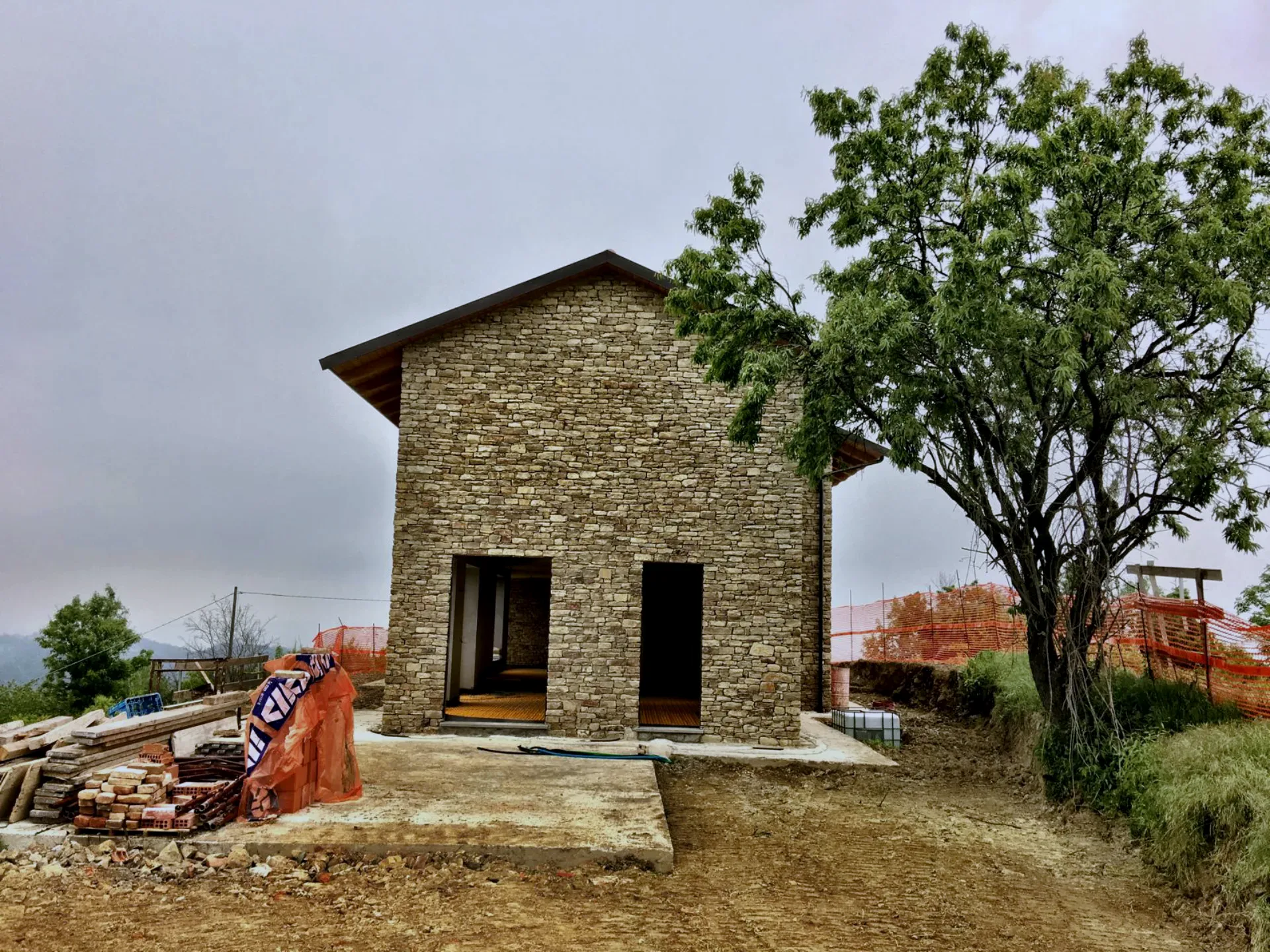 The same house, under construction